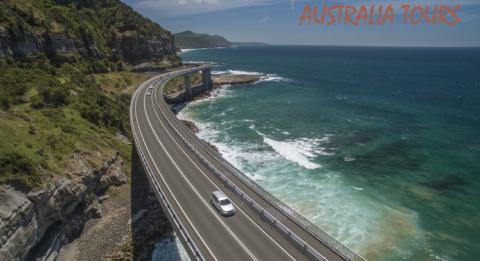 Sea Cliff Bridge, Clifton Aerial of a car taking the scenic route over Sea Cliff Bridge, Clifton